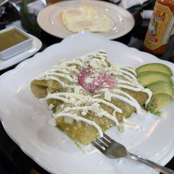 Sunrise Cafe - Green chicken enchiladas with eggs over easy. Soooo good! I could drink the green sauce. - American Near Me - Kokomo, Indiana Sunrise Cafe - Green chicken enchiladas with eggs over easy. Soooo good! I could drink the green sauce. - American Near Me - Kokomo, Indiana