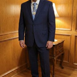Facia Facia - Blue pinstrip suit and beautiful blue paisley tie. Black side buckle shoes.