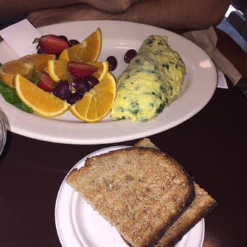 Simple Simon's Bakery & Bistro - Ham and spinach omelette with wheat toast - Bakeries Near Me - Riverside, California Simple Simon's Bakery & Bistro - Ham and spinach omelette with wheat toast - Bakeries Near Me - Riverside, California