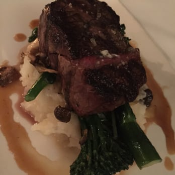 Bouchon - More late 80s/90s stacked plating. Also steak is strangely cut in the middle. Flavors were good, but dish was nothing to write home about - French Near Me - Santa Barbara, California
