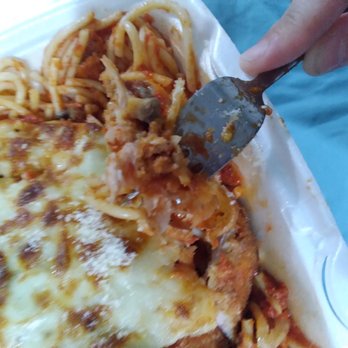 DeRangos Pizza Palace - a hand holding a spatula - Pizza Near Me - Racine, Wisconsin DeRangos Pizza Palace - a hand holding a spatula - Pizza Near Me - Racine, Wisconsin