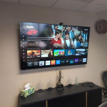 Innovative Switch - TV mounted in our conference room - Home Theatre Installation Near Me