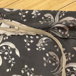 Fatima's Precision Tailoring - Replaced zipper that was the wrong size, left too long and just hanging in the dress
