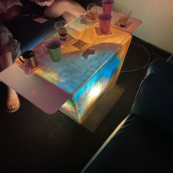 Cosmo's Bar & Lounge - Cool illuminated table. - Pizza Near Me - Dallas, Texas