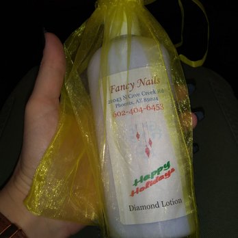 Fancy Nails & Spa - Second picture I'm posting because I'm obsessed with this place now...they gave me and my cousin a little holiday gift.. So sweet! - Nail Salons Near Me - Phoenix, Arizona