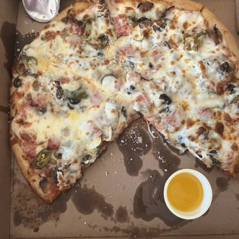 Oriole Pizza - a half eaten pizza in a box - Pizza Near Me - Randallstown, Maryland