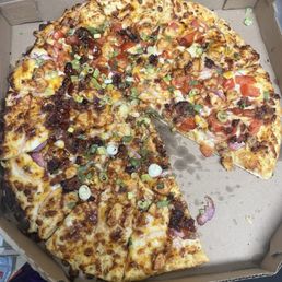 Old looking Bbq chicken pizza with "extra" chicken Old looking Bbq chicken pizza with "extra" chicken