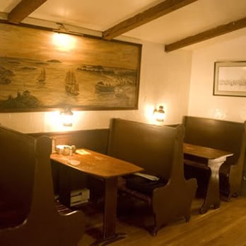 The Cabin - a dining area with booths and tables - Pizza Near Me - Bath, Maine The Cabin - a dining area with booths and tables - Pizza Near Me - Bath, Maine