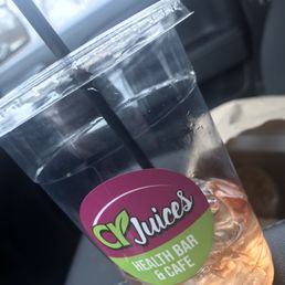 a drink in a plastic cup a drink in a plastic cup