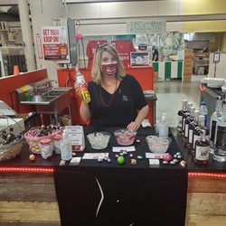Yoga Pants Vodkas - Business owner and her stand at the market