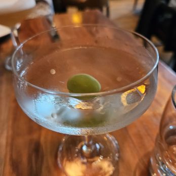 Nightingale - Martini (3 separate olives were brought with it) in a very classic glass - Live/Raw Food Near Me - Vancouver, British Columbia Nightingale - Martini (3 separate olives were brought with it) in a very classic glass - Live/Raw Food Near Me - Vancouver, British Columbia