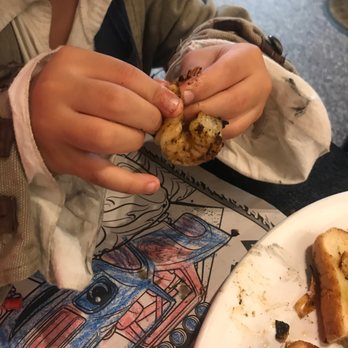 Ribeyes Steakhouse - The little guy getting his shrimp on! - Steakhouses Near Me - Beaufort, North Carolina