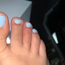 Deluxe spa pedicure let with streaks and lines Deluxe spa pedicure let with streaks and lines