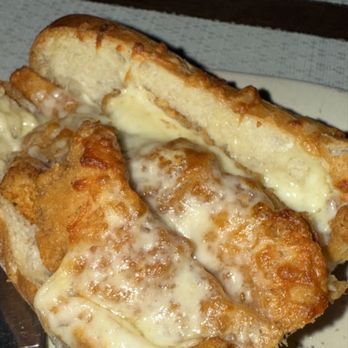 Greg's Tavern - Chicken fingers, Mozzarella Sticks and French Fry sandwich with marinara sauce. - Pizza Near Me - Beverly, Massachusetts
