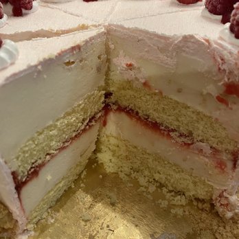 Cold Stone Creamery - a cake with raspberries on top - Ice Cream & Frozen Yogurt Near Me - Queen Creek, Arizona
