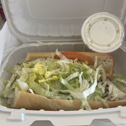 The shredded roast beef, buffalo chicken, smothered, and devil sauce with mayo, lettuce, tomato, and melted provolone The shredded roast beef, buffalo chicken, smothered, and devil sauce with mayo, lettuce, tomato, and melted provolone