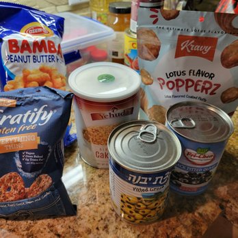 The Shuk - a variety of food items on a counter - Grocery Near Me - Austin, Texas
