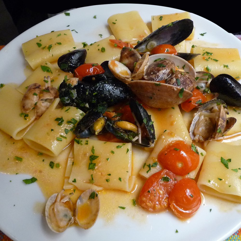Hosteria Toledo - Paccheri with mussels and clams - Italian Near Me - Naples, NA Hosteria Toledo - Paccheri with mussels and clams - Italian Near Me - Naples, NA