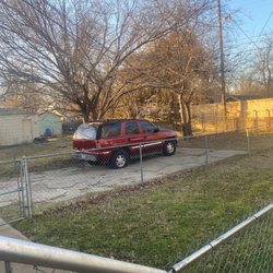 LUXE Sales & Management - Same non working vehicle in driveway.