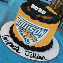 Towson University Cake for 6. Yellow fondant with black piping around the top and bottom. Customized with my name, Logo, and graduation cap