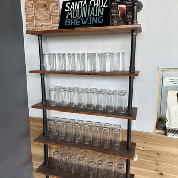Pour Me Taproom - a shelf of glasses - Beer Bar Near Me - Gilroy, California