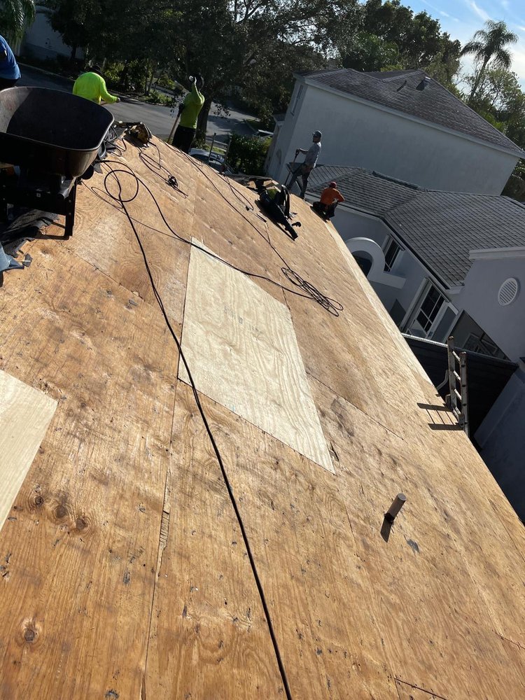 Slide of MZ Roofing Service