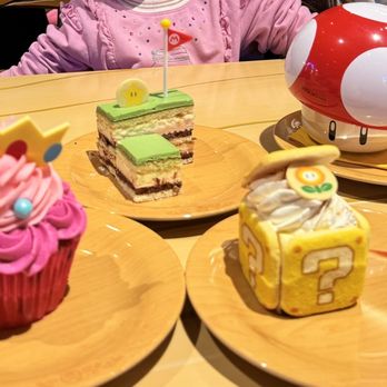 Toadstool Cafe - ? Block Tiramasu, Mt Bean Pole Cake, and Princess Peach Cupcake - Cafes Near Me - Universal City, California Toadstool Cafe - ? Block Tiramasu, Mt Bean Pole Cake, and Princess Peach Cupcake - Cafes Near Me - Universal City, California