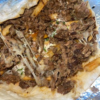 Tacos El Sobrino - And at that the burrito fell apart after she took her bite .. - Tacos Near Me - La Puente, California Tacos El Sobrino - And at that the burrito fell apart after she took her bite .. - Tacos Near Me - La Puente, California