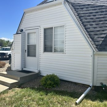Bulldog Roofing - Gutters above the back door and window area. Keeping water away from the foundation. - Roofing Near Me - Longmont, Colorado