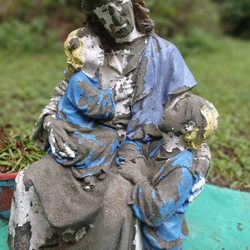 Christ’s Chapel in Memory Park - Smallest Church In America - Sculpture of a mother and two children