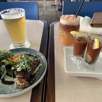 Mala Ocean Tavern - Bruschetta bread with ahi tuna topping and oyster shooter. - Seafood Near Me - Lahaina, Hawaii Mala Ocean Tavern - Bruschetta bread with ahi tuna topping and oyster shooter. - Seafood Near Me - Lahaina, Hawaii