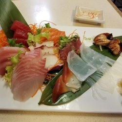 Yokohama Sushi - This was today's lunch. I had a Sashimi Deluxe and added squid, eel and clam. It was amazing!