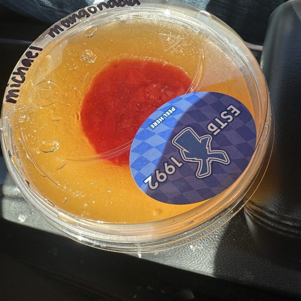 False advertisement is crazy Dutch ! :( supposed to be Topped w/ Strawberry Fruit & a Hint of Tajín  not just a small dot of it! L location