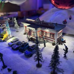 Railroad Hobbies - The Diner and some matchbox cars.