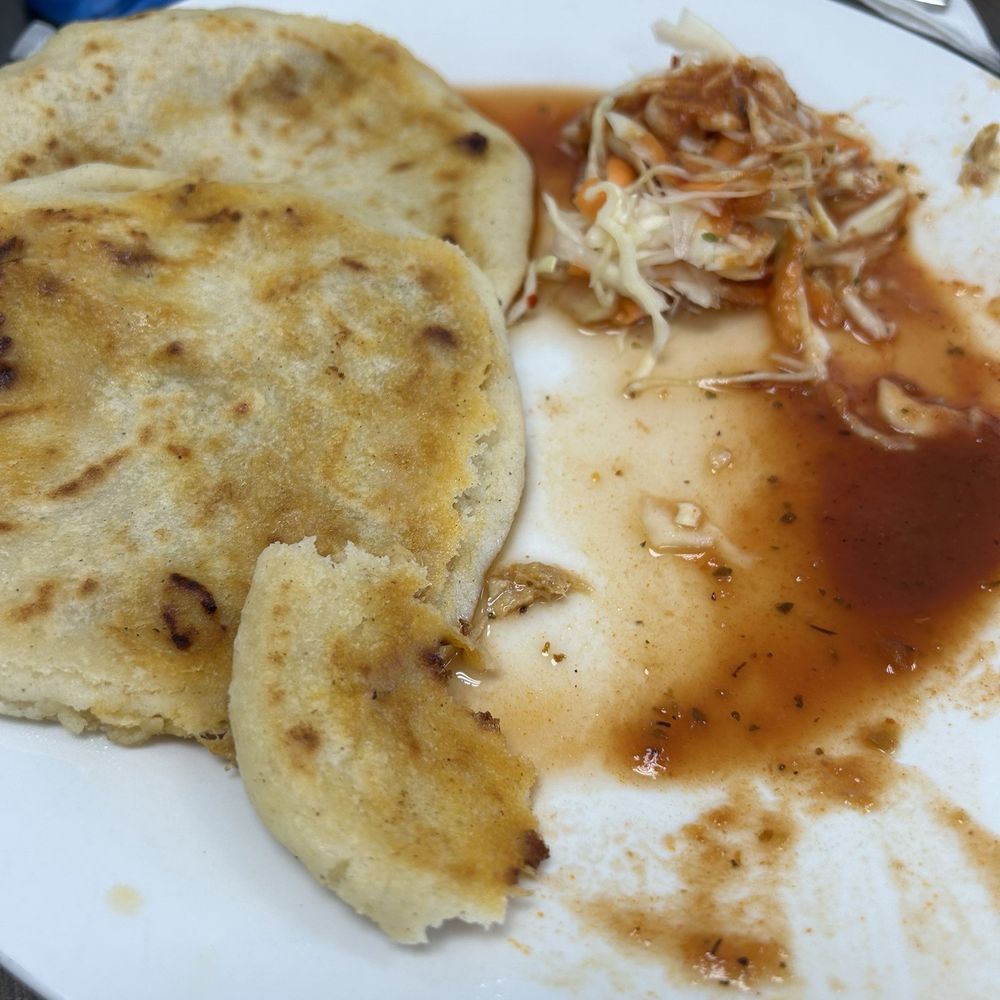 El Viejo Central American Kitchen - Pupusas (what's left of them) with some curtido (vinegar based slaw) and tomato sauce. - Latin American Near Me - Silver Spring, Maryland El Viejo Central American Kitchen - Pupusas (what's left of them) with some curtido (vinegar based slaw) and tomato sauce. - Latin American Near Me - Silver Spring, Maryland