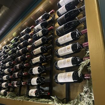 RoVino Restaurant + Bar - Bottle wall decor, love. - Italian Near Me - San Diego, California RoVino Restaurant + Bar - Bottle wall decor, love. - Italian Near Me - San Diego, California