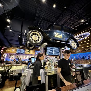 Ford's Garage Dearborn - Car above the bar. - Burgers Near Me - Dearborn, Michigan