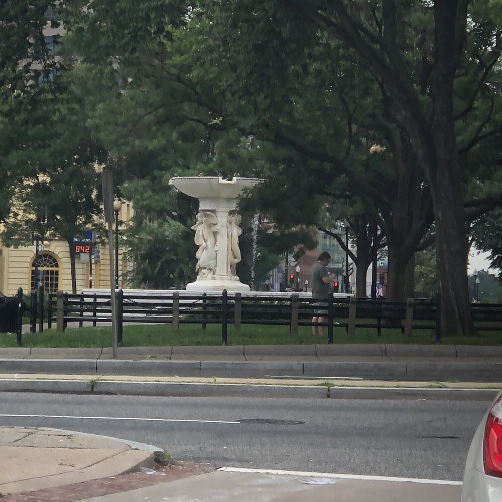 The beautiful fountain in the center of the circle
