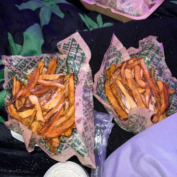 Wingstop - two baskets of french fries on a table - Chicken Wings Near Me - Oxnard, California Wingstop - two baskets of french fries on a table - Chicken Wings Near Me - Oxnard, California