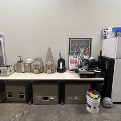 The Organizing Genie - This is like night and day compared to how it looked before. There were probably ten stacked boxes in front of this table.