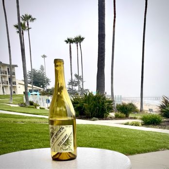 Kon Tiki Inn - We enjoyed a nightly glass of wine on our little patio while watching for whales - Hotels Near Me - Pismo Beach, California