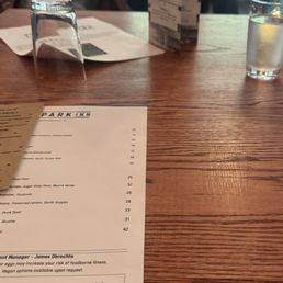 Comfy seating with pillows.  Beautiful menu and specials.