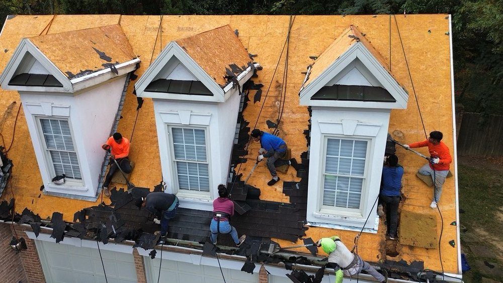 Slide of DIM Construction and Roofing