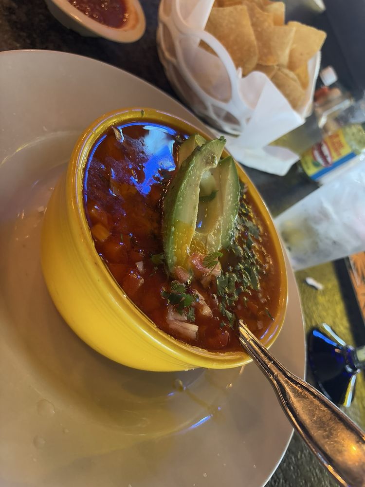 Ricky Cancun Mexican Grill Logo