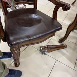 If you zoom in on the broken leg, you can see it had been glued before.