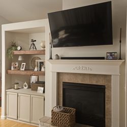 Gold Creek Construction - The shelves,painted cabnets and tv mount were all my work in this photo