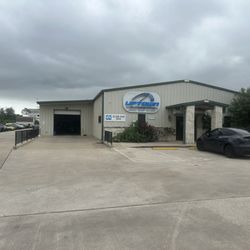 Uptown Automotive - A front view of our repair facility and where you will find the pros to get your car back to new!