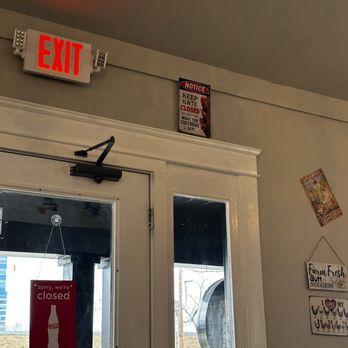 Only Chicken - the exit sign above the door - Chicken Shop Near Me - Nashville, Tennessee