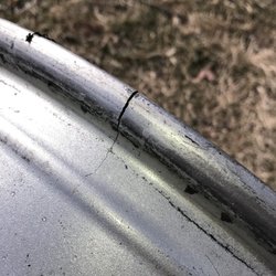 Hubcaps & Wheels Unlimited - The damage area was cutoff and a new piece welded. The area was then machined.