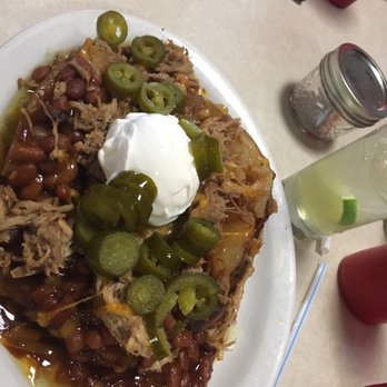 Buzz's BBQ & Steakhouse - Loaded, no really loaded, baked potato - Barbeque Near Me - Nevada, Missouri